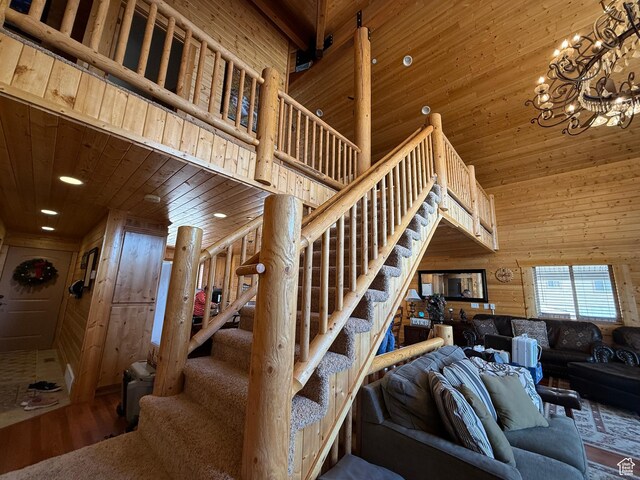 8043 E Badger Dr N, Heber City, UT 84032 - stairway featuring wooden ceiling, wood finished floors, wooden walls, a chandelier, and recessed lighting