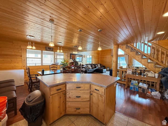 8043 E Badger Dr N, Heber City, UT 84032 - kitchen featuring wood ceiling, plenty of natural light, a center island, open floor plan, and wooden walls