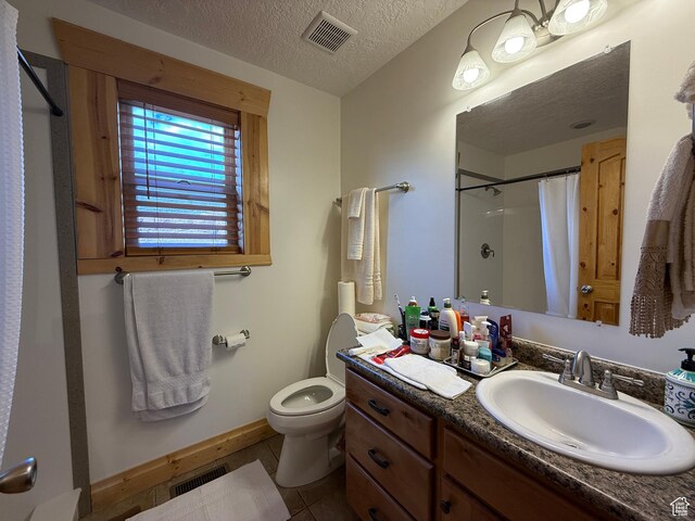 8043 E Badger Dr N, Heber City, UT 84032 - full bathroom with baseboards, a shower with curtain, a textured ceiling, toilet, and tile patterned flooring
