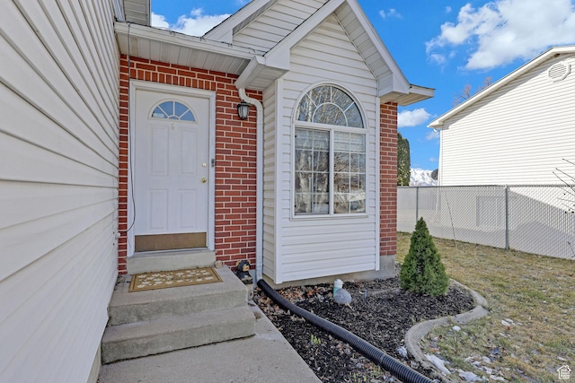 518 W 1330 N, Logan, UT 84341 - property entrance featuring brick siding and fence
