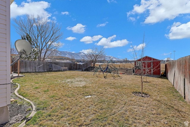 518 W 1330 N, Logan, UT 84341 - view of yard featuring a storage shed, an outdoor structure, and a mountain view