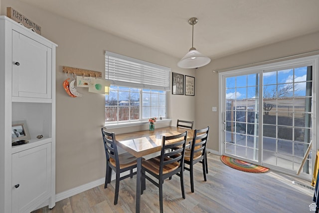 518 W 1330 N, Logan, UT 84341 - dining room with light wood finished floors and baseboards