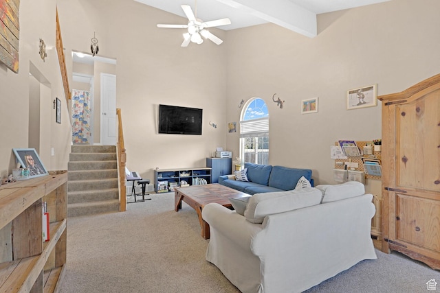 518 W 1330 N, Logan, UT 84341 - living area with carpet flooring, a towering ceiling, a ceiling fan, and stairs