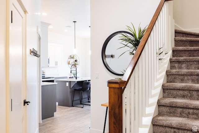 560 N Ventura Ln, Washington, UT 84780 - staircase with recessed lighting and wood finished floors
