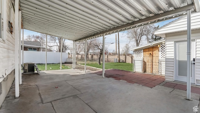 5460 S 4360 W, Kearns, UT 84118 - view of patio / terrace featuring a fenced backyard and central AC