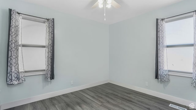 5460 S 4360 W, Kearns, UT 84118 - empty room featuring wood finished floors, a ceiling fan, visible vents, and baseboards