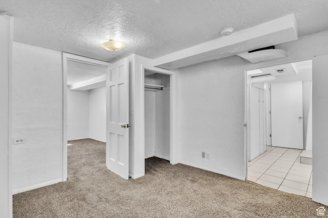 770 W 700 N, Provo, UT 84601 - unfurnished bedroom with carpet flooring, a textured ceiling, and a closet