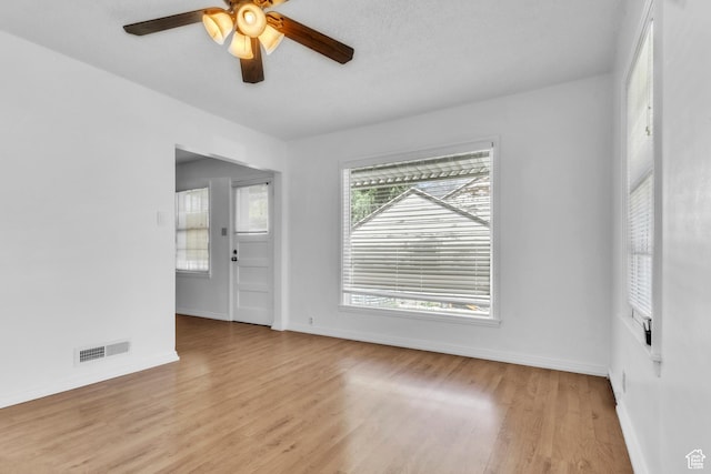 770 W 700 N, Provo, UT 84601 - unfurnished room featuring wood finished floors, a ceiling fan, and baseboards
