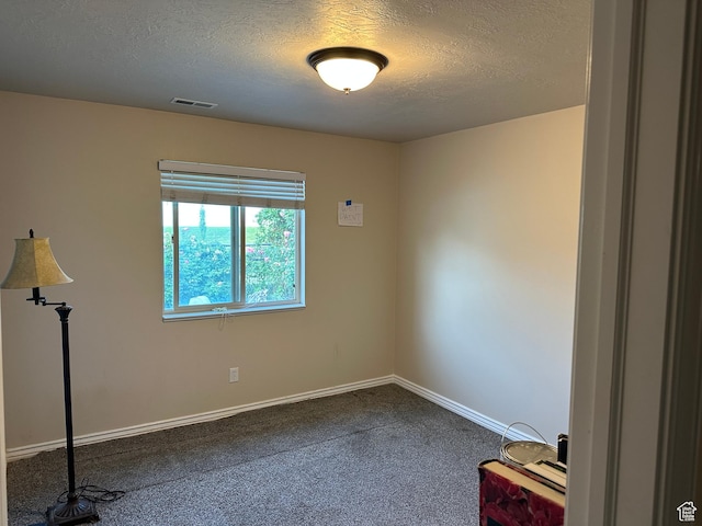 742 N Stonne Ln, Kaysville, UT 84037 - unfurnished room with dark carpet and a textured ceiling
