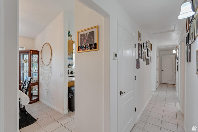 2163 W 127 S, Hurricane, UT 84737 - corridor featuring light tile patterned floors, attic access, and baseboards