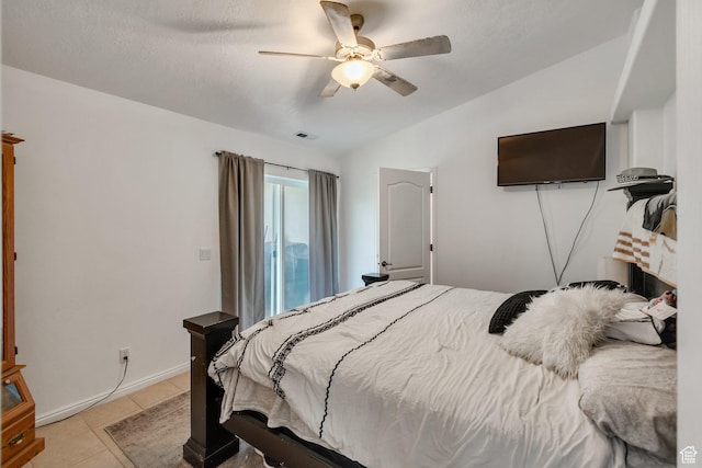 2163 W 127 S, Hurricane, UT 84737 - bedroom with light tile patterned flooring, visible vents, baseboards, ceiling fan, and vaulted ceiling