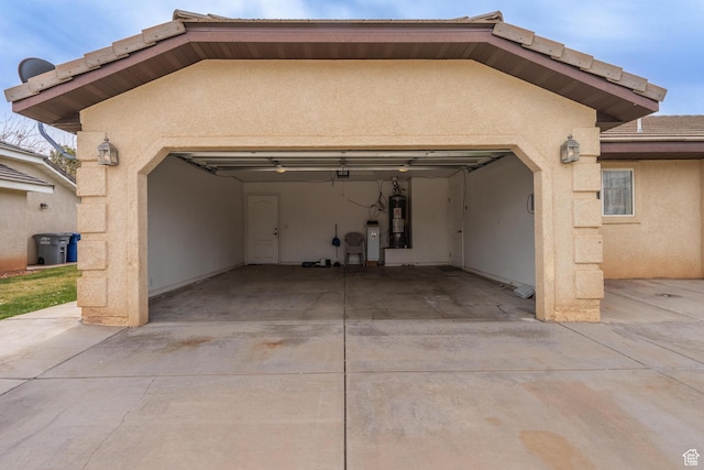 2163 W 127 S, Hurricane, UT 84737 - garage with water heater and concrete driveway