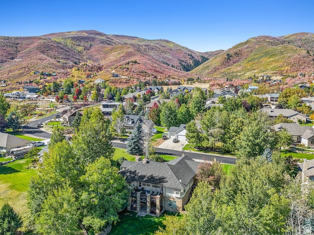 drone / aerial view featuring a mountain view and a residential view