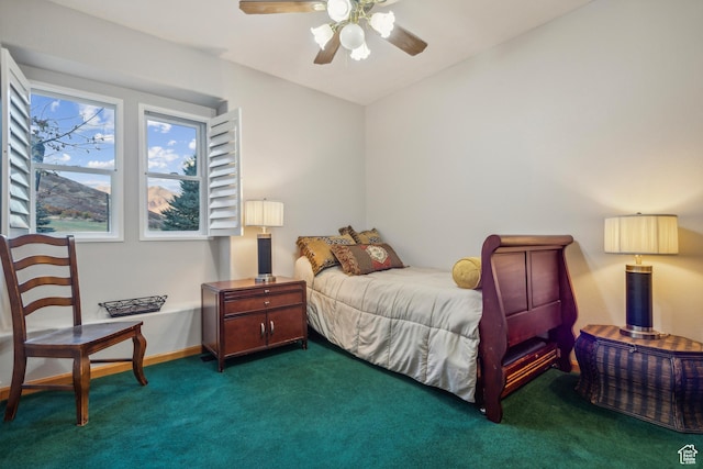carpeted bedroom with baseboards and ceiling fan