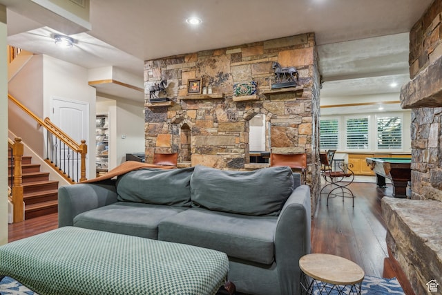 living area featuring stairway, wood finished floors, and billiards