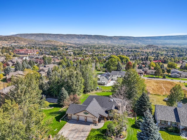birds eye view of property featuring a mountain view and a residential view