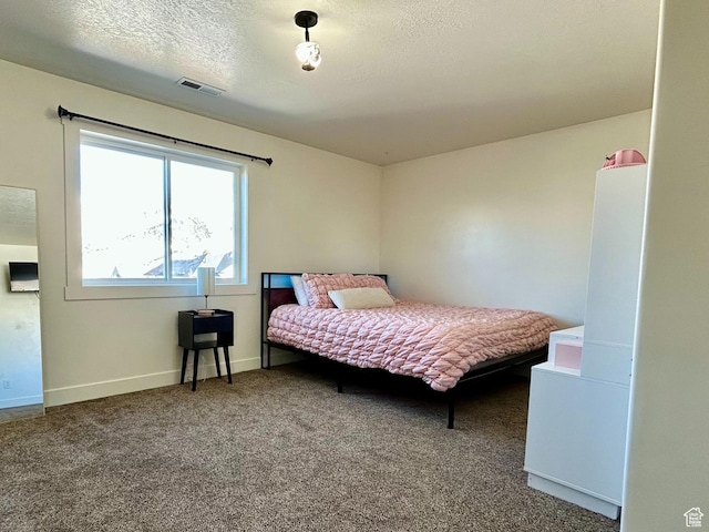 640 S 100 E, Mantua, UT 84324 - carpeted bedroom featuring visible vents, baseboards, and a textured ceiling