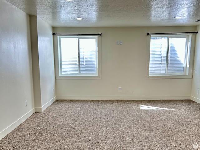 640 S 100 E, Mantua, UT 84324 - carpeted empty room featuring a textured ceiling and baseboards