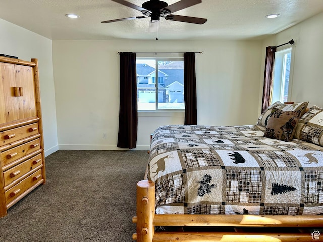 640 S 100 E, Mantua, UT 84324 - bedroom featuring multiple windows, carpet, baseboards, and a textured ceiling