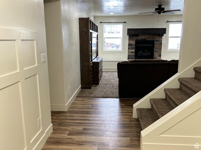 640 S 100 E, Mantua, UT 84324 - interior space with stairway, wood finished floors, baseboards, a fireplace, and ceiling fan