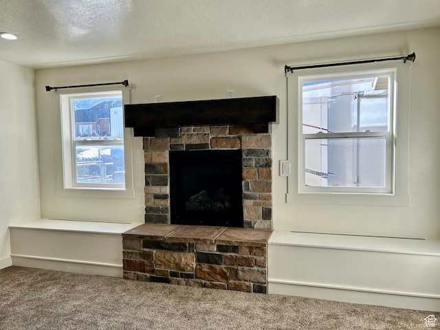 640 S 100 E, Mantua, UT 84324 - details featuring carpet flooring, a fireplace, and a textured ceiling