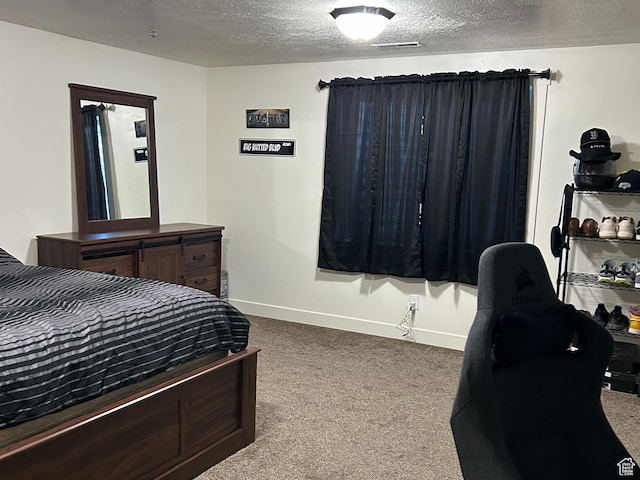 640 S 100 E, Mantua, UT 84324 - bedroom with visible vents, a textured ceiling, baseboards, and dark colored carpet