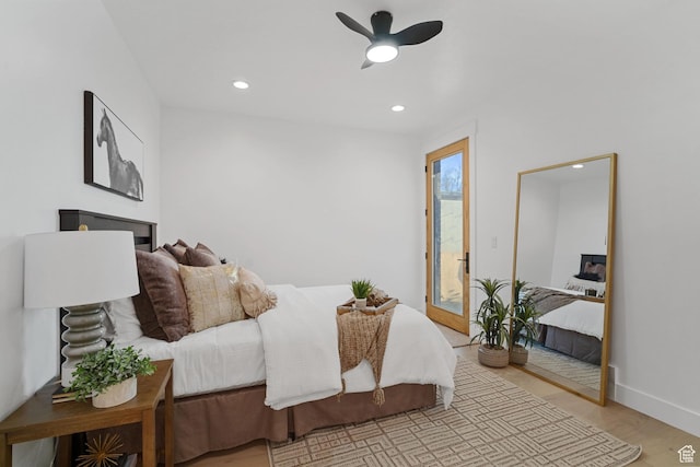 603 N Darwin St E Unit 10, Salt Lake City, UT 84103 - bedroom featuring access to exterior, recessed lighting, light wood-style floors, and baseboards