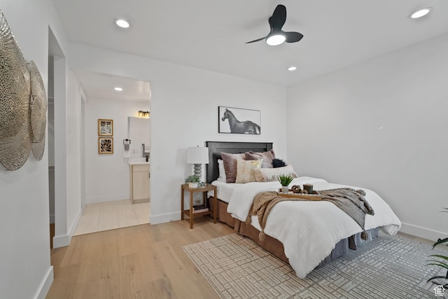 603 N Darwin St E Unit 10, Salt Lake City, UT 84103 - bedroom featuring recessed lighting, baseboards, ensuite bath, and light wood finished floors