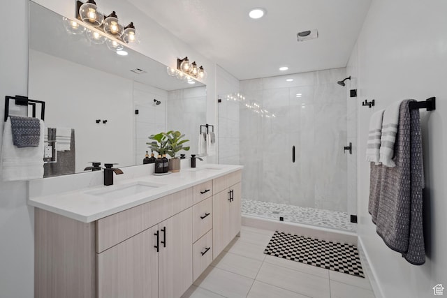 603 N Darwin St E Unit 10, Salt Lake City, UT 84103 - bathroom featuring double vanity, tile patterned flooring, a stall shower, and a sink