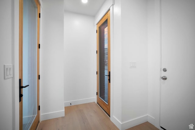 603 N Darwin St E Unit 10, Salt Lake City, UT 84103 - hallway featuring baseboards and light wood-style floors