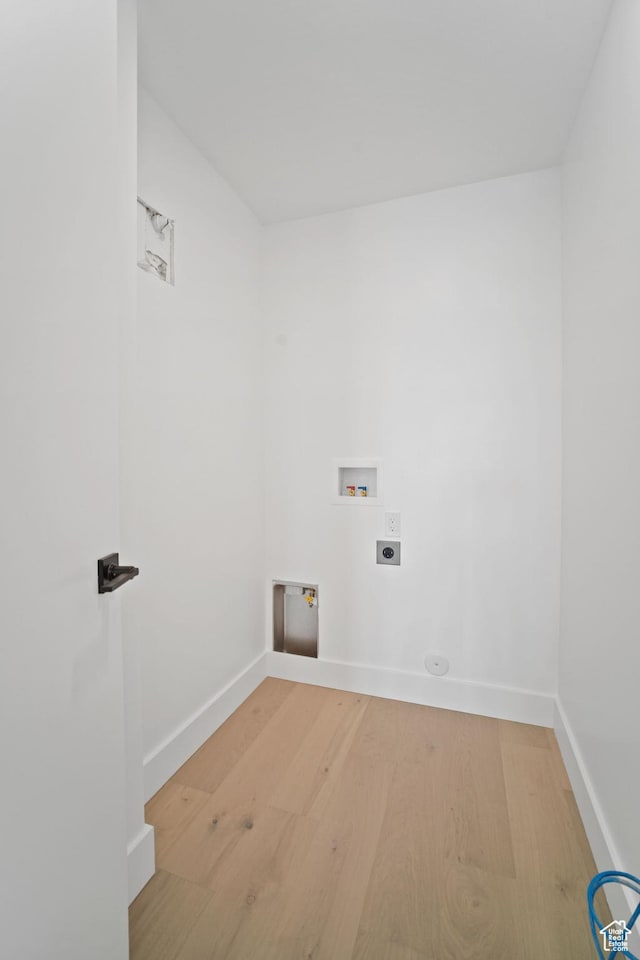 603 N Darwin St E Unit 10, Salt Lake City, UT 84103 - clothes washing area with hookup for a washing machine, wood finished floors, baseboards, laundry area, and electric dryer hookup