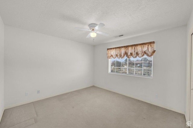 976 N Quail Ridge Dr, Washington, UT 84780 - carpeted empty room featuring visible vents, a textured ceiling, baseboards, and ceiling fan
