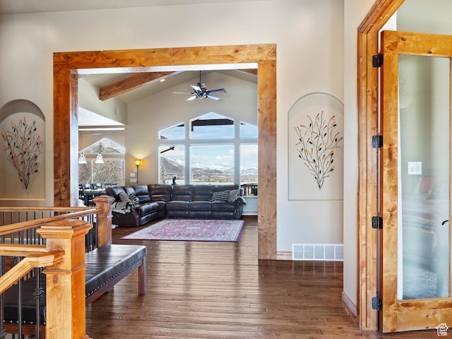 946 S Meadow Lark Ln E, Huntsville, UT 84317 - living area featuring lofted ceiling with beams, baseboards, hardwood / wood-style flooring, visible vents, and a ceiling fan