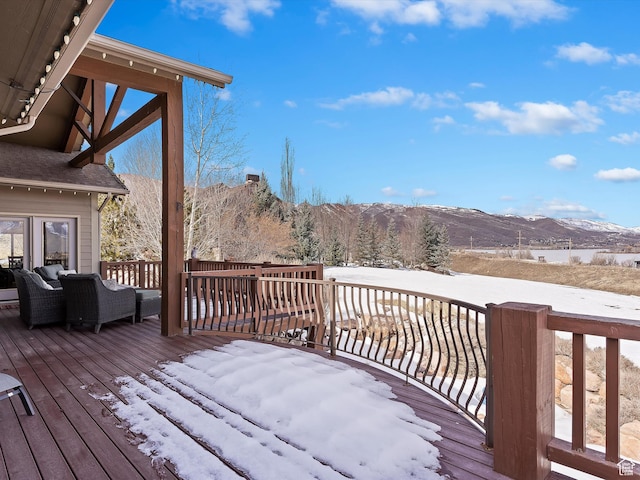 946 S Meadow Lark Ln E, Huntsville, UT 84317 - snow covered deck with an outdoor living space and a mountain view