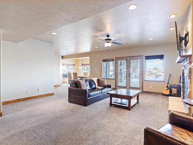 946 S Meadow Lark Ln E, Huntsville, UT 84317 - carpeted living room with baseboards, a textured ceiling, ceiling fan, and recessed lighting