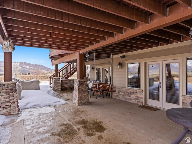 946 S Meadow Lark Ln E, Huntsville, UT 84317 - view of patio with a mountain view, outdoor dining space, and stairway