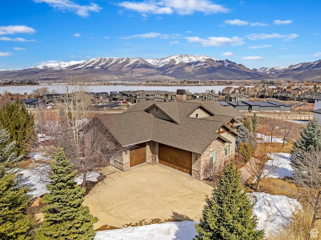 property view of mountains with a water view and a residential view