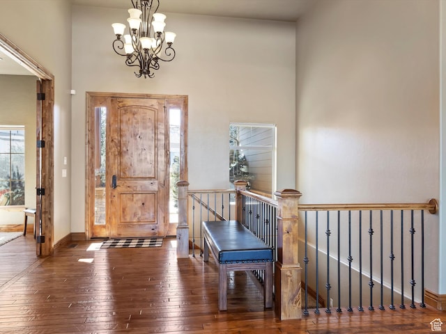 946 S Meadow Lark Ln E, Huntsville, UT 84317 - entrance foyer with baseboards, an inviting chandelier, and hardwood / wood-style flooring