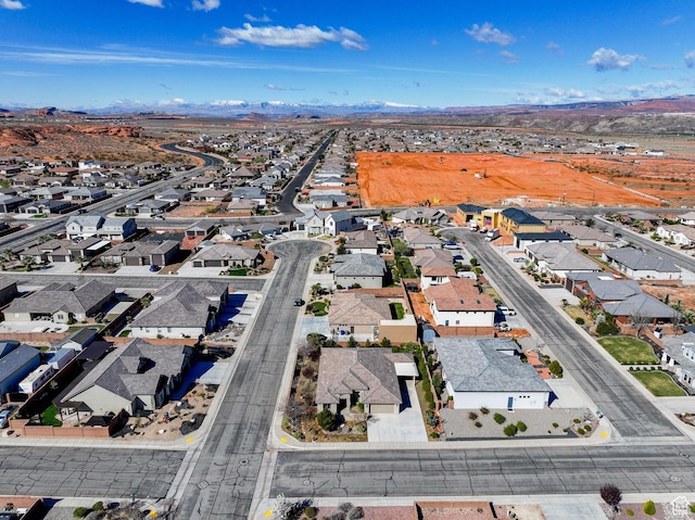 birds eye view of property featuring a mountain view and a residential view