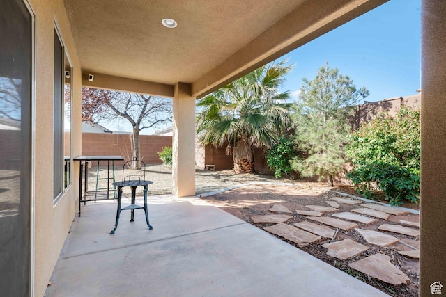 view of patio with fence