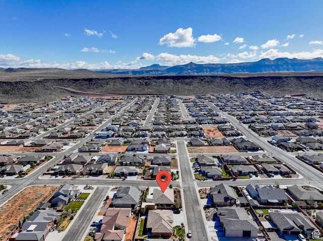 bird's eye view featuring a mountain view and a residential view