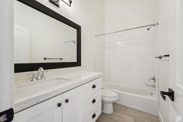 1127 N 520 W Unit 40, Midway, UT 84049 - bathroom with toilet, vanity, shower / bathtub combination, and wood finished floors