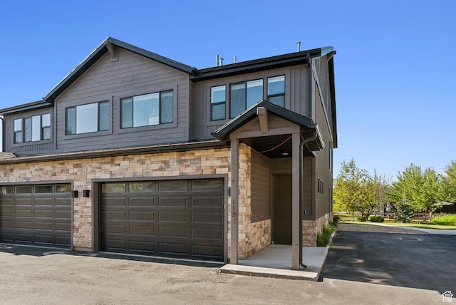 1127 N 520 W Unit 40, Midway, UT 84049 - view of property with stone siding and a garage