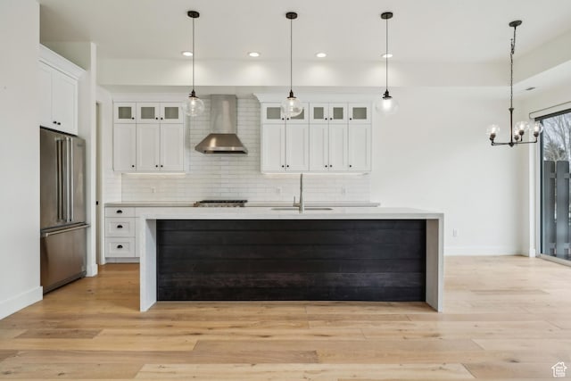 1127 N 520 W Unit 40, Midway, UT 84049 - kitchen with high end fridge, wall chimney exhaust hood, light countertops, tasteful backsplash, and recessed lighting