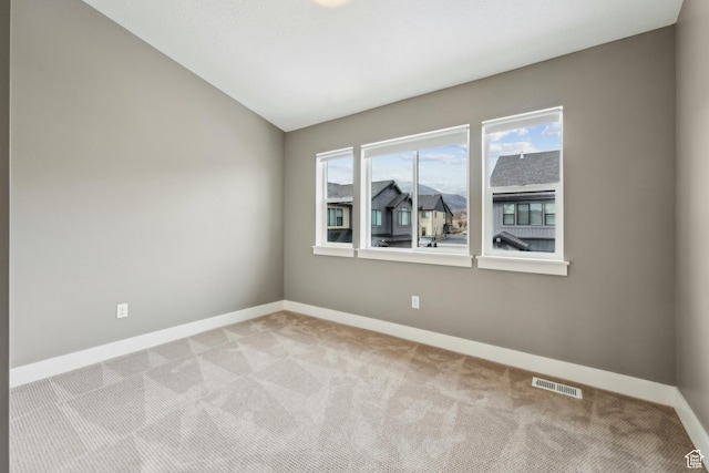 1127 N 520 W Unit 40, Midway, UT 84049 - unfurnished room featuring carpet, baseboards, and lofted ceiling