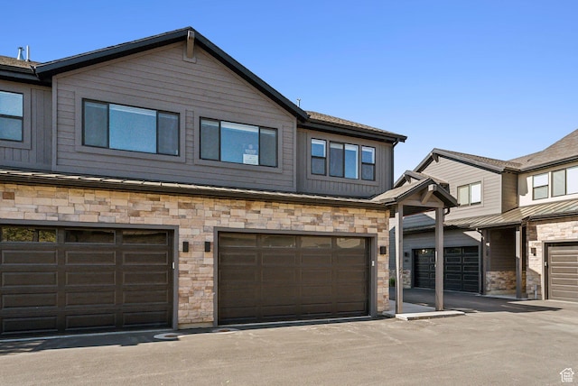 1127 N 520 W Unit 40, Midway, UT 84049 - view of property featuring stone siding and an attached garage