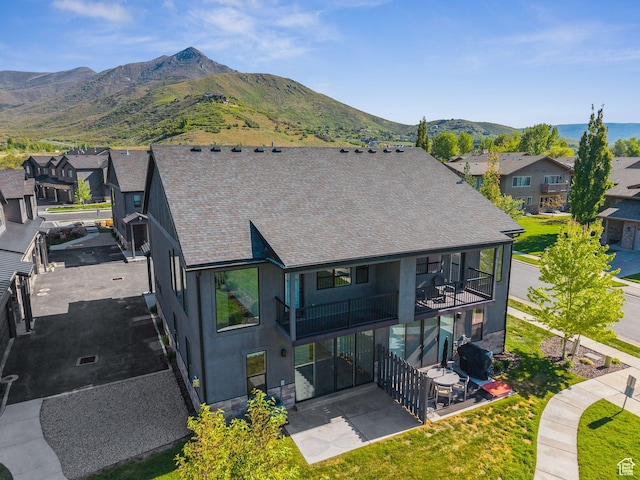 1127 N 520 W Unit 40, Midway, UT 84049 - rear view of property with a balcony, a patio, a residential view, stucco siding, and a mountain view