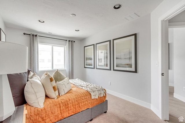 bedroom featuring visible vents, recessed lighting, baseboards, and carpet floors