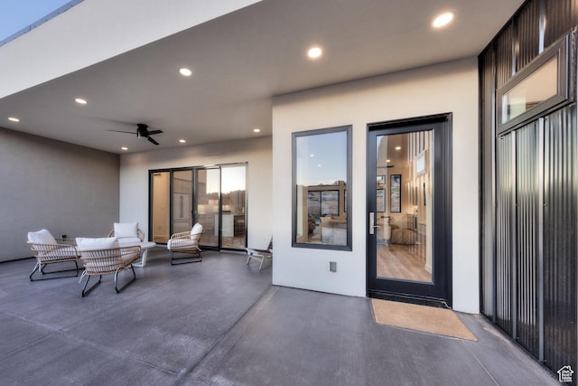 view of patio featuring ceiling fan