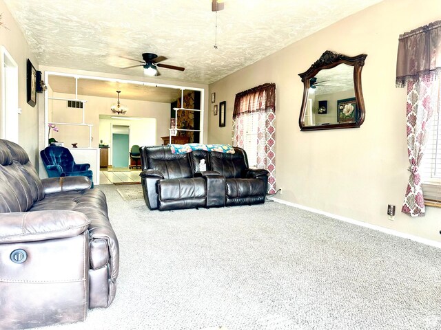 439 E 400 S, Vernal, UT 84078 - carpeted living area with visible vents, a textured ceiling, baseboards, and ceiling fan